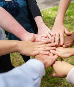 Image of Team Stacking Hands