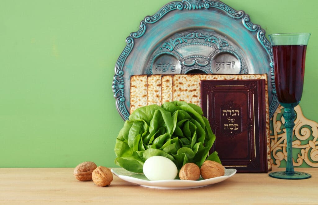 Pesah celebration concept (jewish Passover holiday). Traditional book with text in hebrew: Passover Haggadah (Passover Tale)